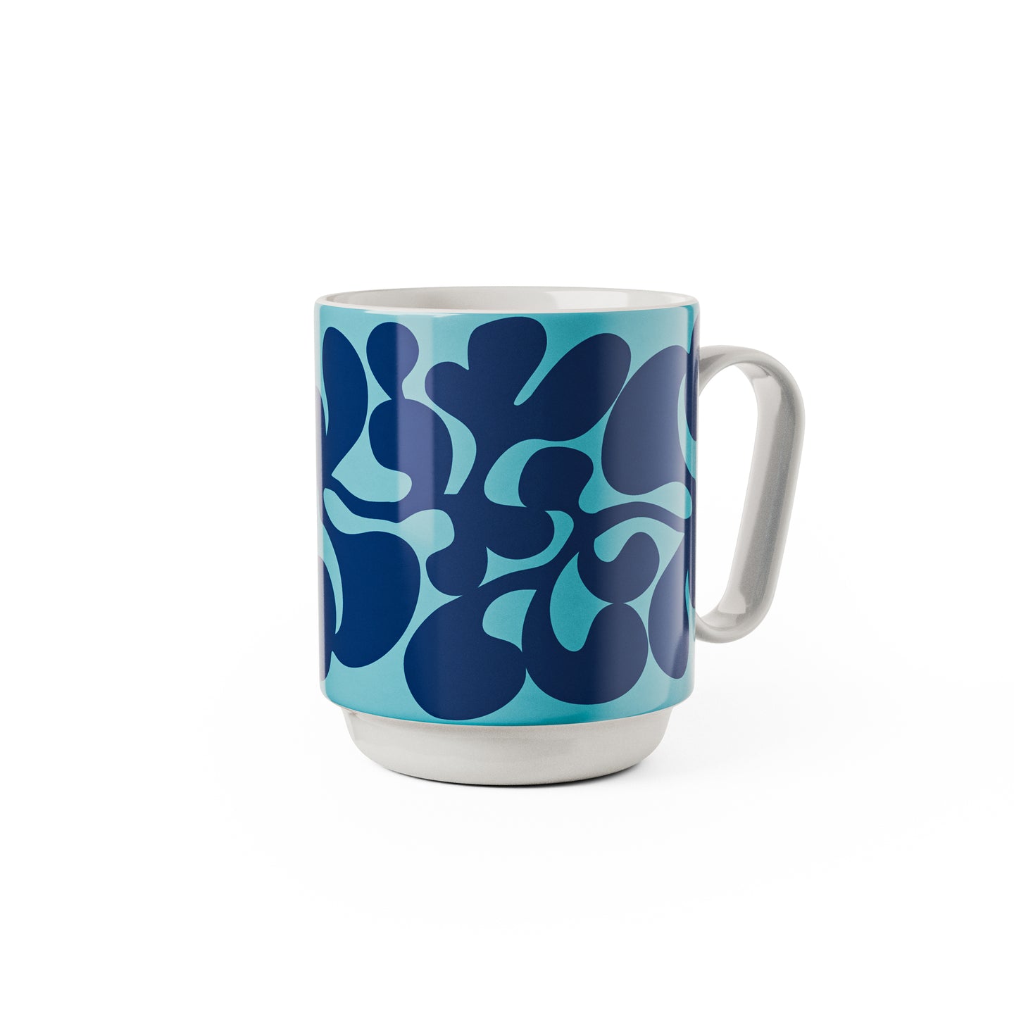 A blue and white patterned mug with a handle on the right side, against a white background.